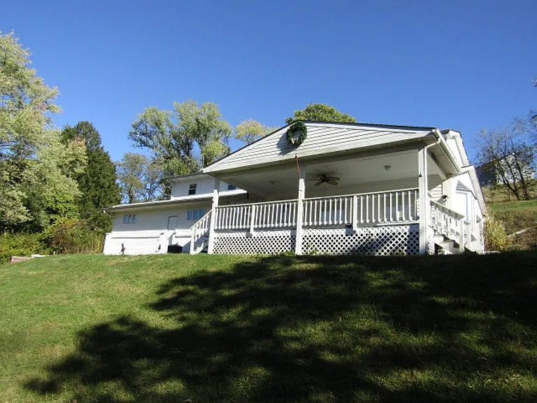 Charming Home with Updated Features on 0.8 Acres for $95,000