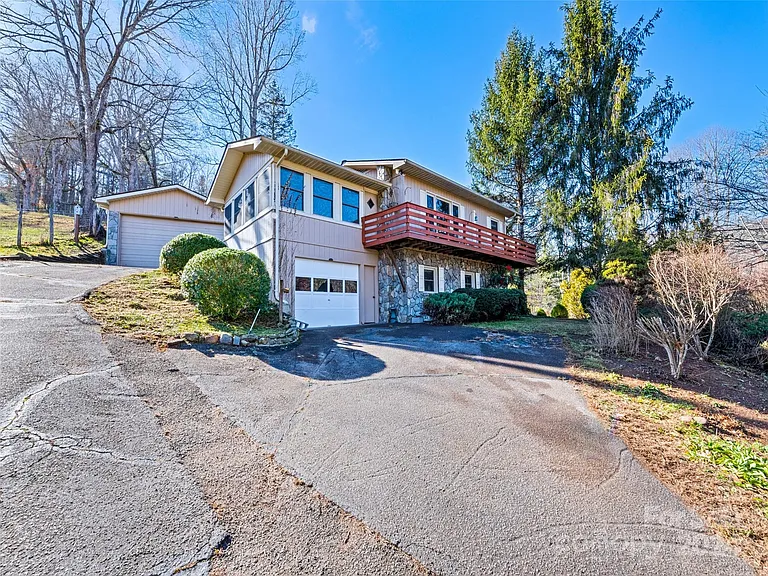 Cozy Home with Open Kitchen, Basement Garage, and Incredible Views on 2.52 Acres – $260,000