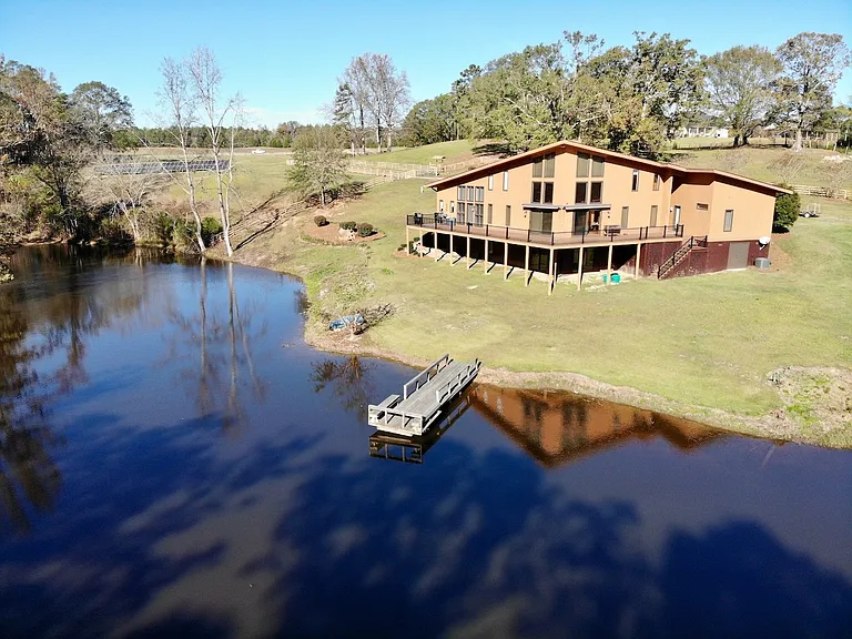 Stunning 4-Bedroom Custom Home on 21.65± Acres with Pond and Pastures. Est. $5.000