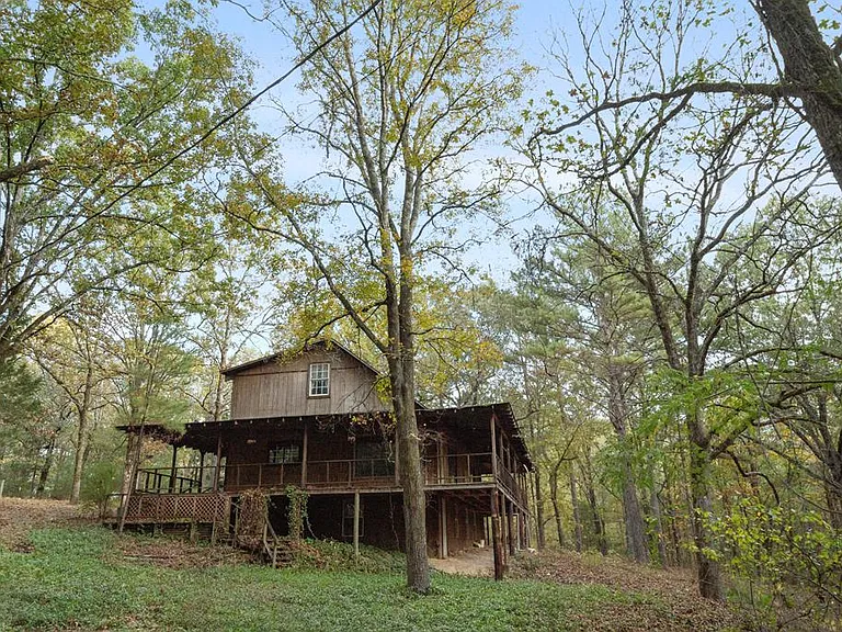 Rustic Fixer-Upper Cabin Nestled on 2.3 Acres of Serenity $89.000