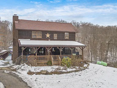 Idyllic 32-Acre Retreat with Cedar Home, Barn, and Modern Amenities – 216 Cedarwood Dr, Greenup, KY $287.000