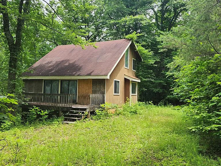 Diamond in the rough. Secluded Mountain Home on 5+ Acres – $149,900