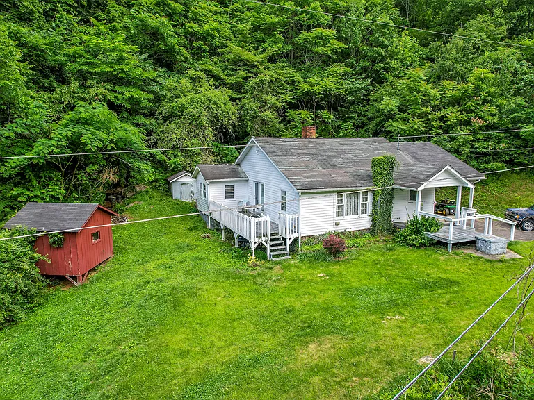 $129,900 – 21.17 Acres with Home, River Access & Mobile Home Sites in Stinnett, KY
