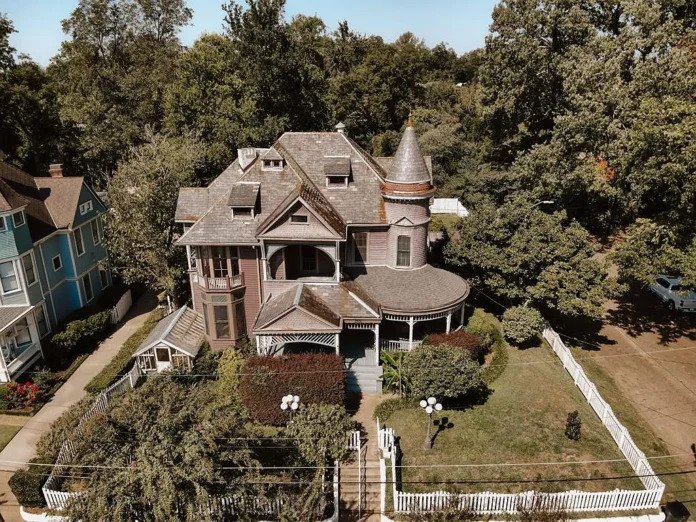 Spacious 1900-built residence, 8 bedrooms/6 bathrooms. $350,000