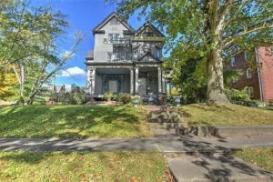 8 Bedroom Stately Victorian Home With Original Woodwork Lists At $89,900!