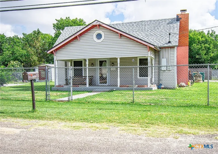 Charming Corner-Lot Home with Multiple Storage Buildings and Endless Potential in the Heart of Nolanville