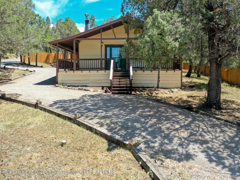 Timeless Midtown Retreat with Vaulted Beamed Ceilings, Hardwood Floors, Hot Tub, Wraparound Deck, and Exceptional In-Town Convenience