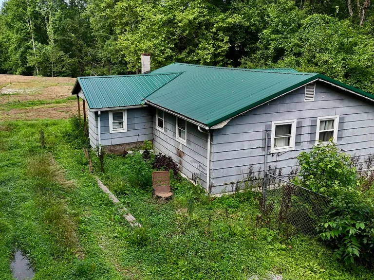 Private 11-Acre Retreat with Endless Potential in Gray