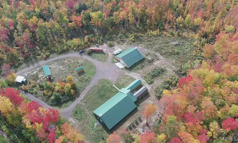 40-Acre Off-Grid Retreat with Creek & Modern Home