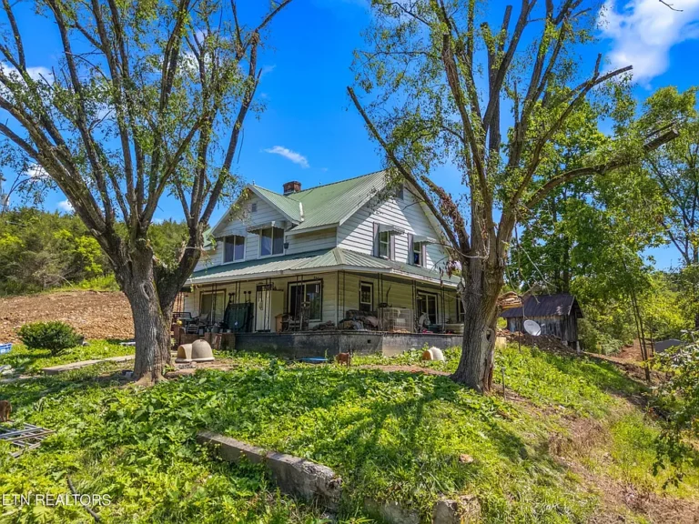 1930s Farmhouse on 5.83 Acres with Creek