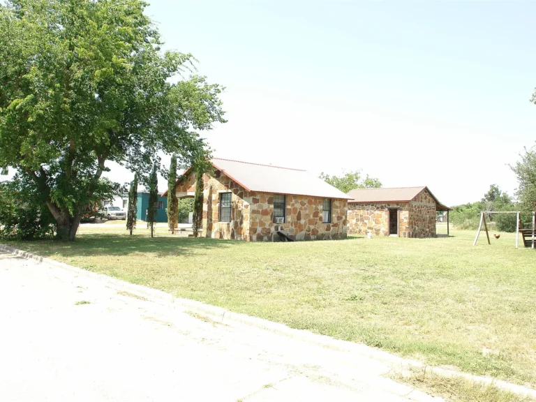 Charming Native Rock Home on a Spacious Corner Lot in San Saba with Expansion Potential