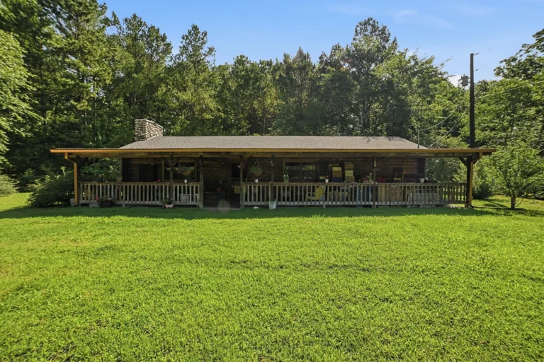 Log Cabin Home with 0.66 Acres in Camden, Tennessee